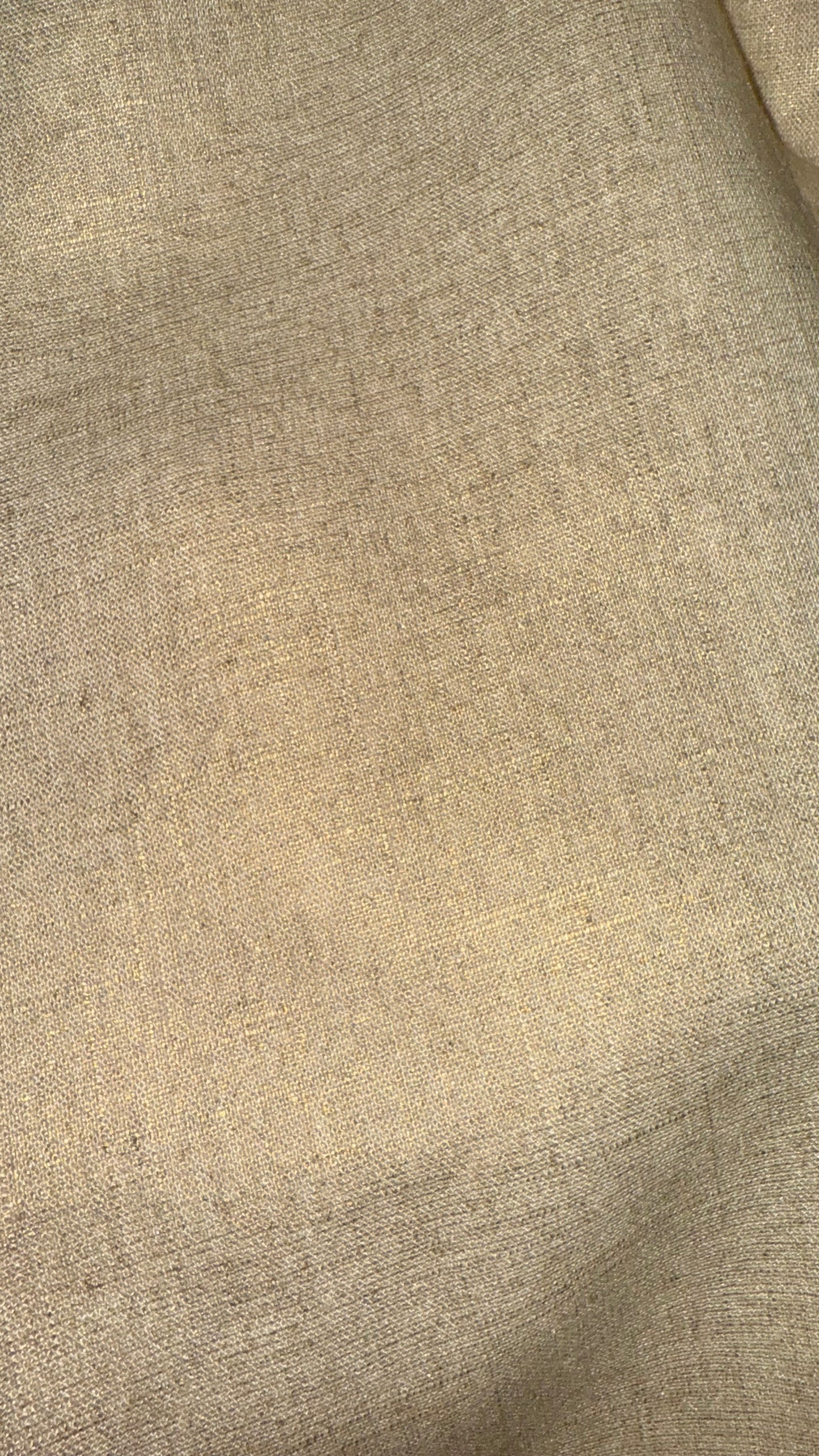 Textura do tecido sutilmente dourada